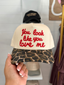 You Look Like You Love Me Trucker Hat